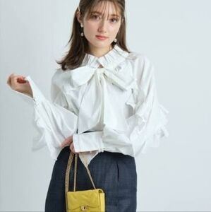 Elegant Cream Blouse with Tie Neck, Japan Purchased Like New